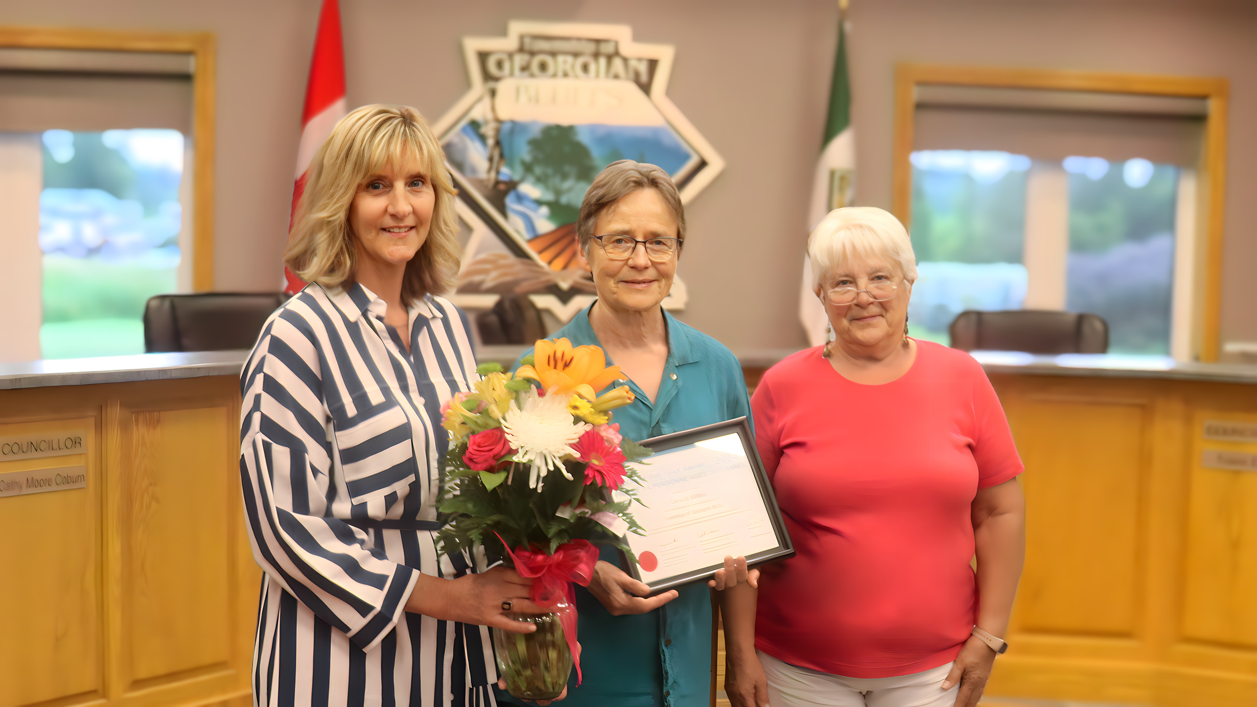 Councillor Coburn, Danuta Valleau, Mayor Carleton