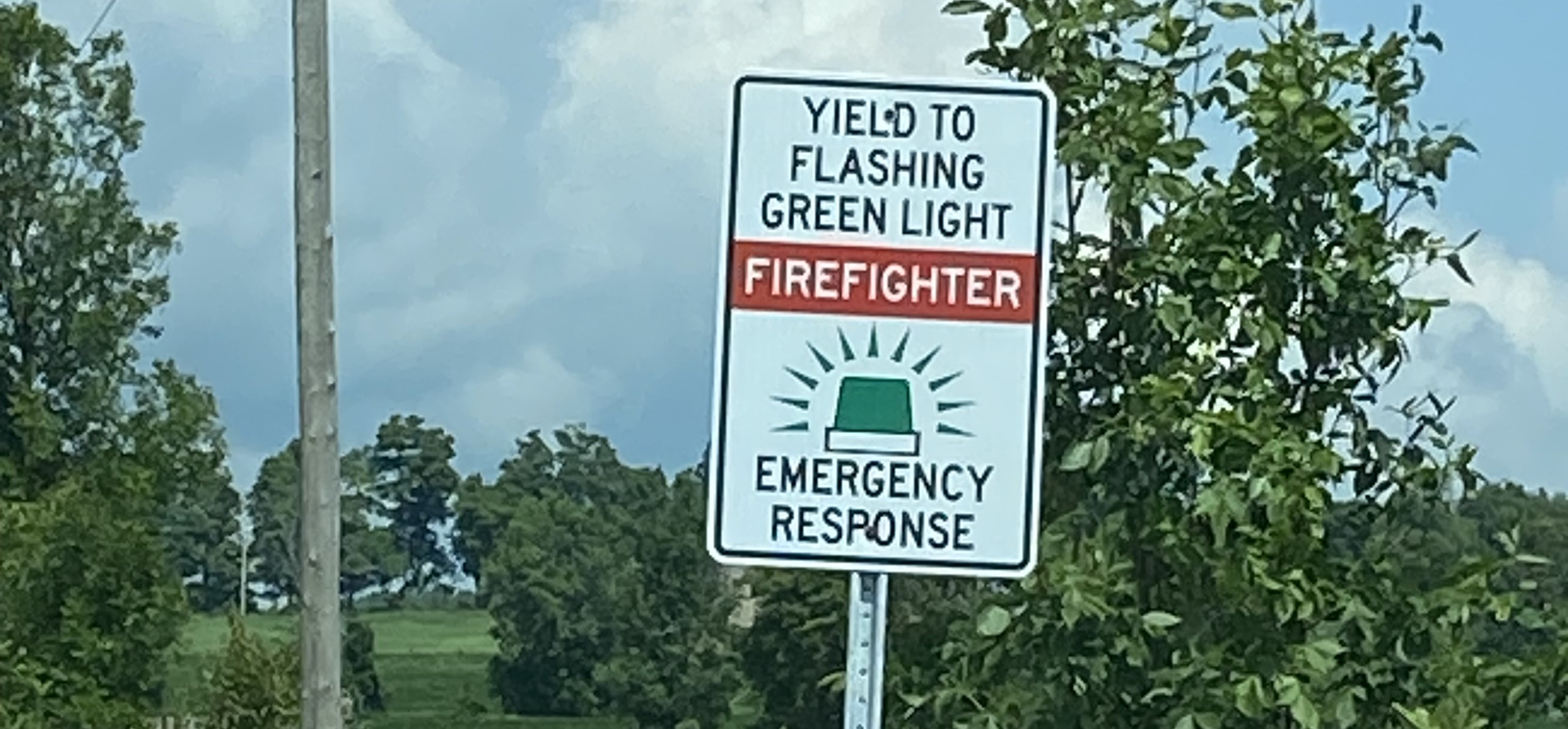 Yield to Green Flashing Light Signs